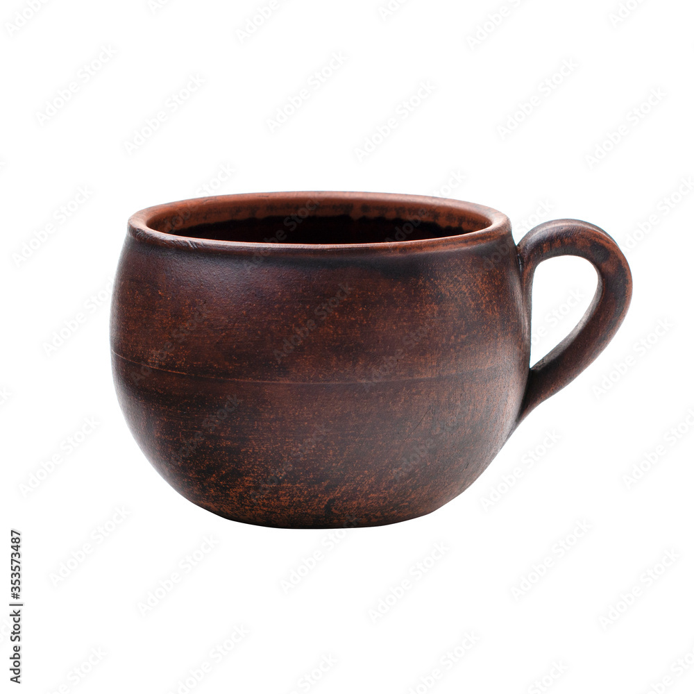red clay mug on a white isolated background red clay mug on a white isolated background