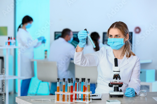 Scientist working with micr...