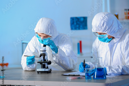 Scientists working in moder...
