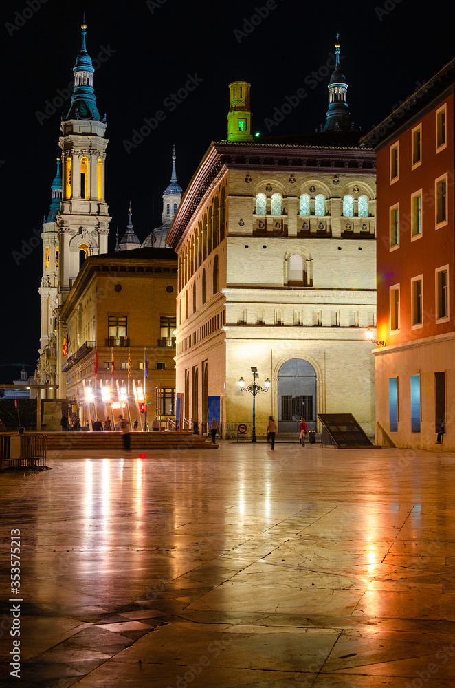 Night photo of Plaza de La Seo and the basilica of Pilar de Zaragoza (Spain) in the background