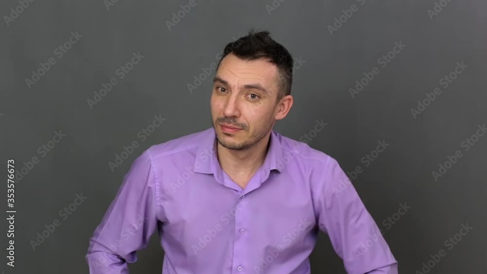 Curious young man close-up. He shows emotions professionally. Soft light. High-quality footage FullHD. Curious young man close-up. He shows emotions professionally. Soft light. High-quality footage FullHD.