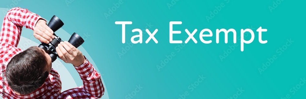 Naklejka premium Tax Exempt. Businessman (man) looks through binoculars. Birds eye view. Focus on text. Blue Background. Business, Finance, Statistics, Analysis, Economy