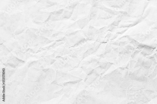 Old crumpled grainy grey paper background texture
