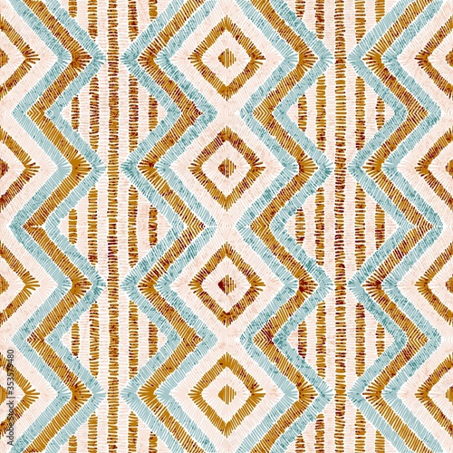Embroidered seamless geometric pattern. Ornament for the carpet. Ethnic and tribal motifs. Vintage grunge texture. Colorful print of handmade. Vector illustration.