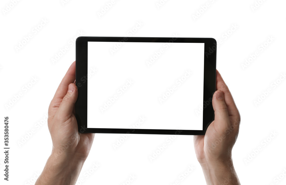 Man holding tablet computer with blank screen on white background, closeup. Modern gadget Man holding tablet computer with blank screen on white background, closeup. Modern gadget