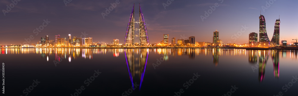 Bahrain skyline with iconic buildings, the Bahrain World Trade Center and the Financial hourbour during night on February 05, 2018, Manama, Bahrain. Bahrain skyline with iconic buildings, the Bahrain World Trade Center and the Financial hourbour during night on February 05, 2018, Manama, Bahrain.