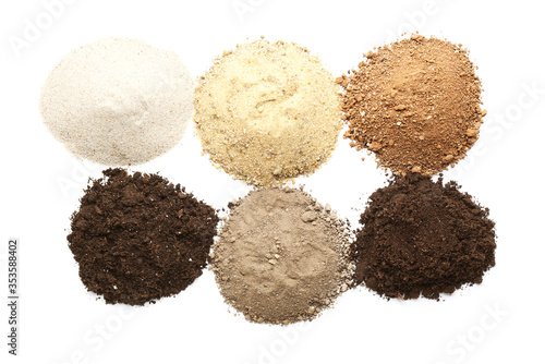 Heaps of different soils on...