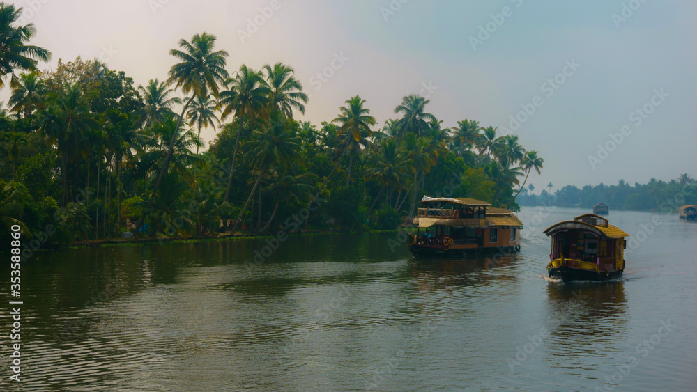 Travel tourism Kerala background -  tourist houseboat on Kerala backwaters. 