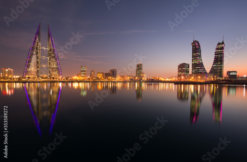 Bahrain skyline with iconic buildings, the Bahrain World Trade Center and the Financial hourbour during night on February 05, 2018, Manama, Bahrain