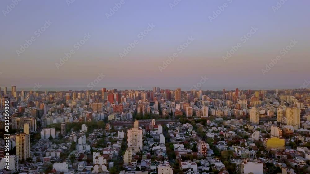 Warm summer sunset airview over a suburb neighborhood in Buenos Aires City Warm summer sunset airview over a suburb neighborhood in Buenos Aires City