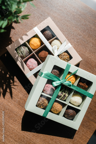 colored truffle candies in a gift box