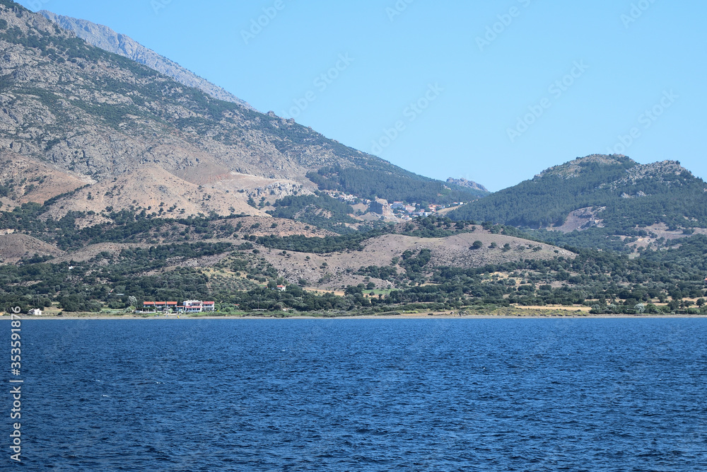 Seascape with Saos mountain and coastline Chora area - Samothraki island view from ferry - Greece, Aegean sea