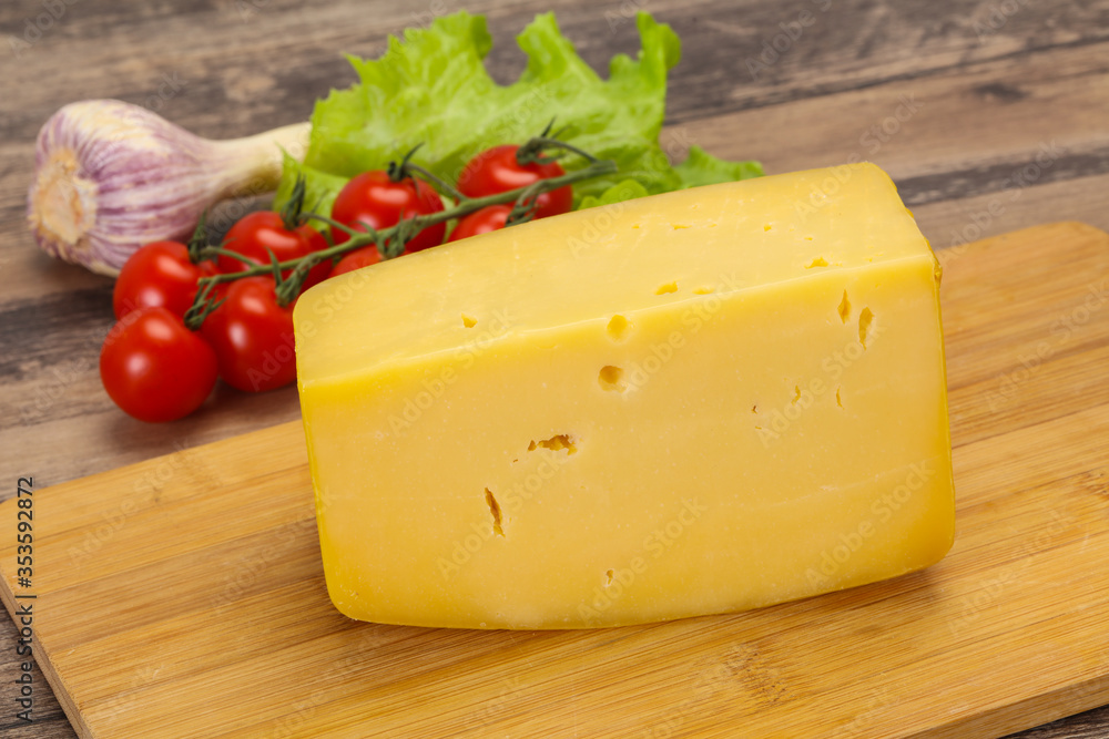 Hard yellow tasty cheese brick Hard yellow tasty cheese brick