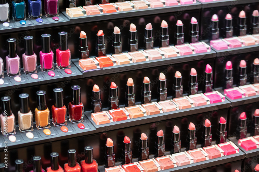 Set of cosmetics on shelves in beauty store Set of cosmetics on shelves in beauty store