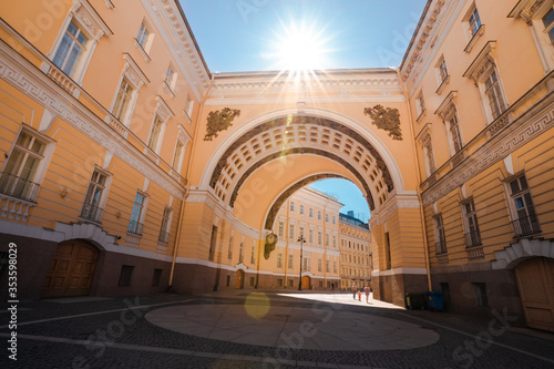 Yellow arch leading to the Palace square to the Hermitage Museum in Saint Petersburg, a tourist attraction in the summer © KseniaJoyg