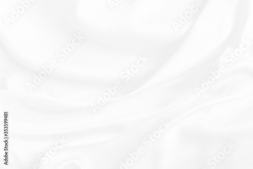 White fabric backround abstract with soft waves. Elegant and luxury silk satin texture.