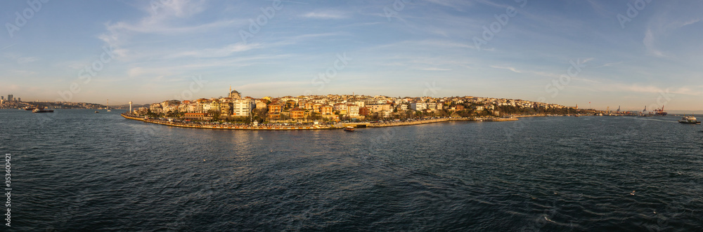 Panoramic view of the Uskudar district of Istanbul from the Bosphorus at sunset. Turkey