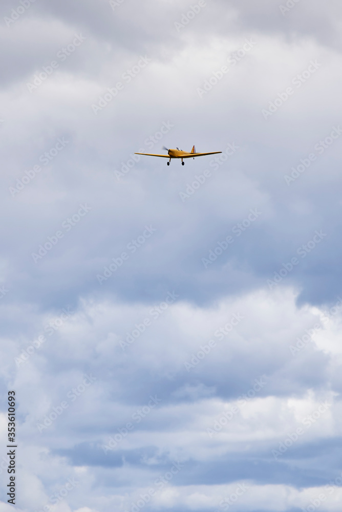 Flight of a radio-controlled airplane in the sky. Flight of a radio-controlled airplane in the sky.