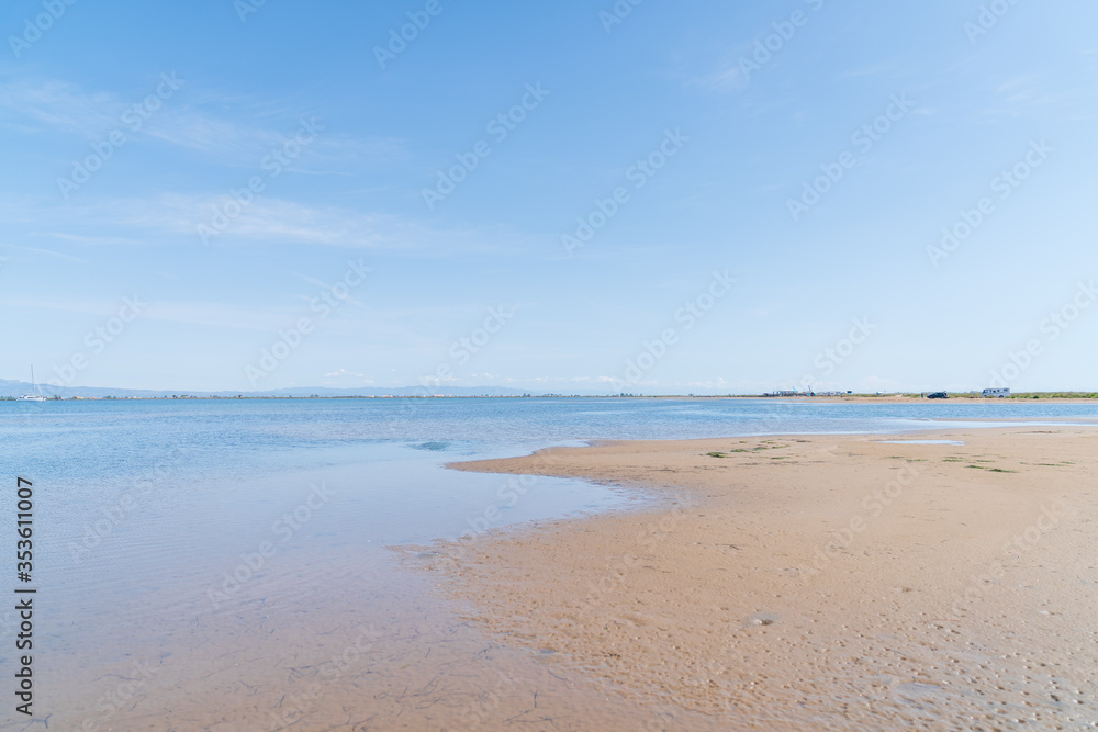 Beach of the Ebro delta. Fine sandy beaches and flat waters.