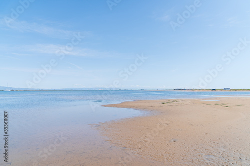 Beach of the Ebro delta. Fine sandy beaches and flat waters.