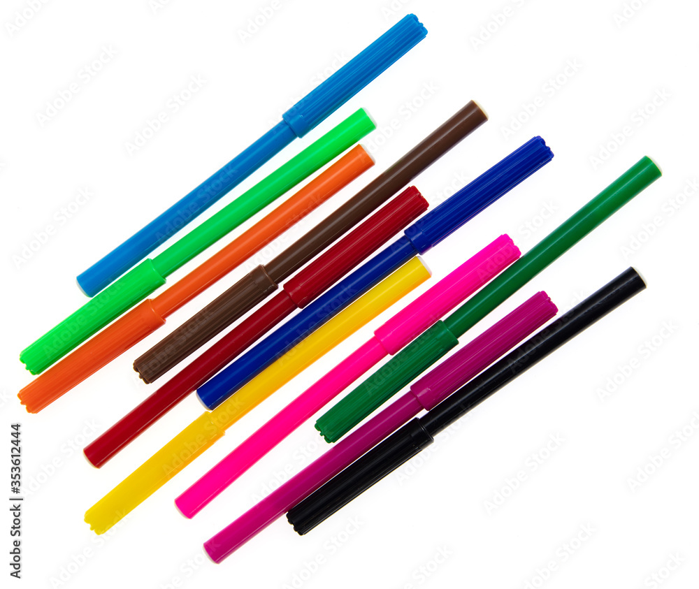 Colored felt-tip pens on a white background. Colored felt-tip pens on a white background.