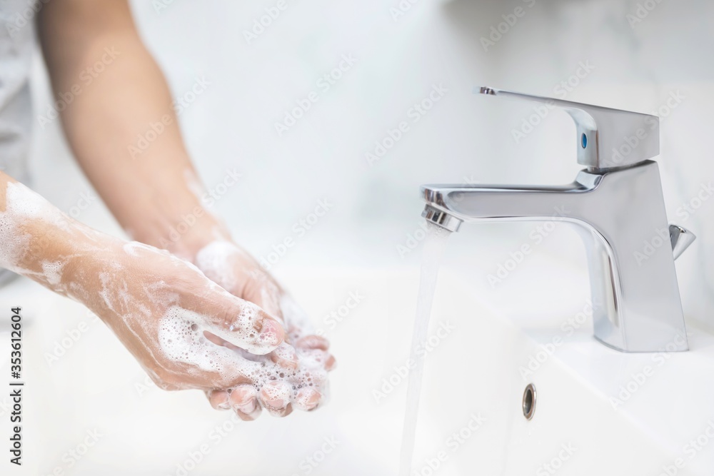 Hygiene. Cleaning Hands. Washing hands with soap under the faucet with water Pay dirt. Prevent sterilize germ bacteria disease. Health care concept. Hygiene. Cleaning Hands. Washing hands with soap under the faucet with water Pay dirt. Prevent sterilize germ bacteria disease. Health care concept.
