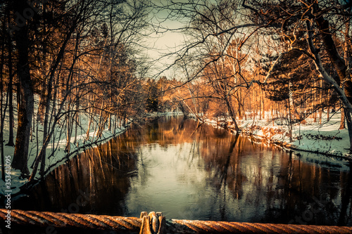 фотографія Winter view from the stone walking bridge of the Flint River in the Richfield Co