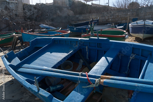 Wallpaper Mural Empty fishing boat at the seaside Torontodigital.ca