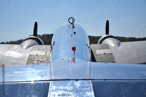 Lockheed Electra 10A vintage airplane preparing for flight on airport in Prague, Czech republic photo