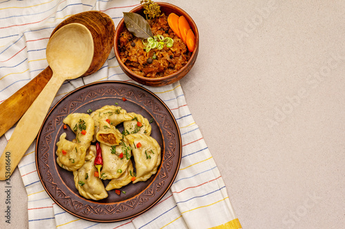 Dumplings stuffed stewed cabbage and sour cream. Traditional Ukrainian dish varenyky
