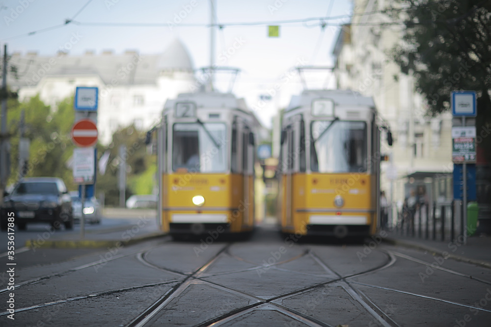 trams city landscape, blurred background traditional european city view, lifestyle