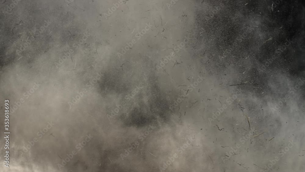 4K Dust and hay explosion cloud descending in slow-motion. Atmospheric ...