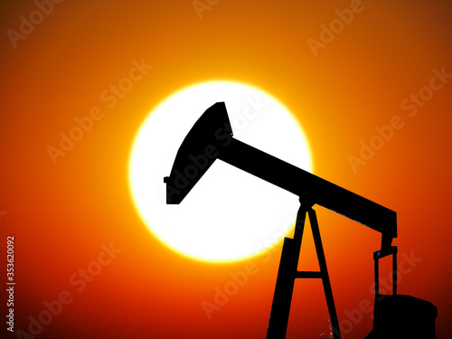 Oil rig on a sunset background. Oil rig on the background of dawn.