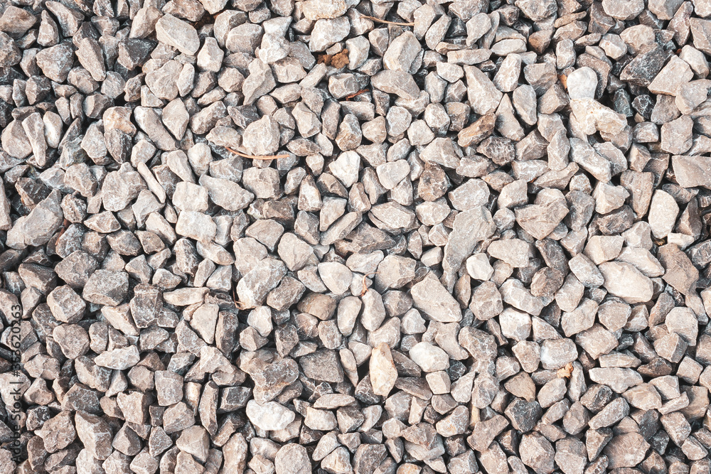 White and grey gravel texture in garden. Pebble background. White and grey gravel texture in garden. Pebble background.