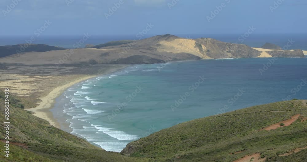 4K locked off stationary motion of the sand dunes and beach at the tip of Cape Reinga being the furthest northern point on the North Island of New Zealand, a famous tourist attraction 4K locked off stationary motion of the sand dunes and beach at the tip of Cape Reinga being the furthest northern point on the North Island of New Zealand, a famous tourist attraction