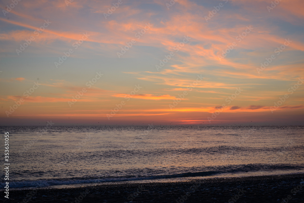 Fototapeta premium beautiful orange sunset by the black sea