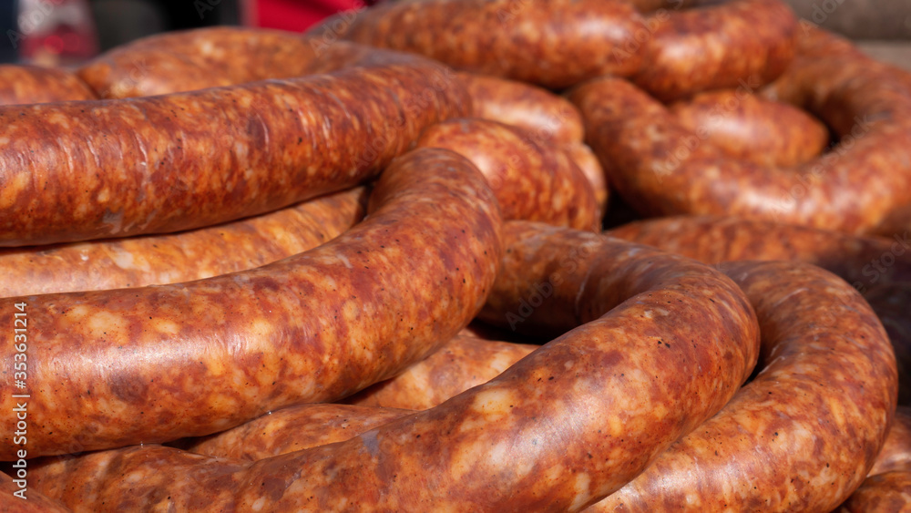 Background of smoked sausage close up Background of smoked sausage close up