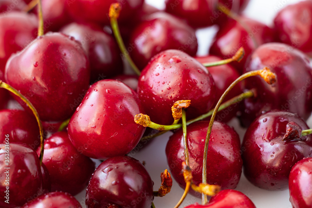 A bunch of ripe cherry berries close-up. Beautiful natural background.