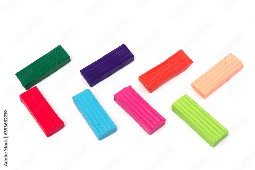 Сolorful plasticine isolated on white background. Space for text Сolorful plasticine isolated on white background. Space for text