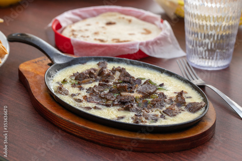 melted cheese with steak 