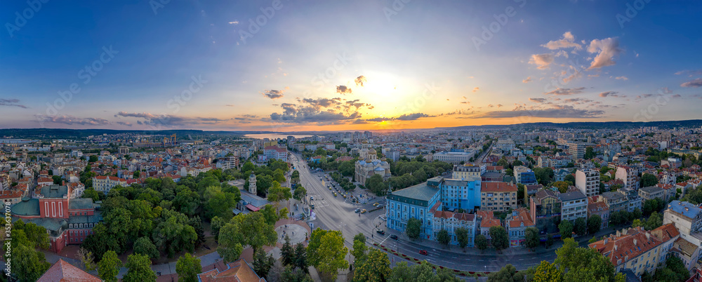 Aerial view from the drone of the magnificent sunset over centrum of Varna city, Bulgaria