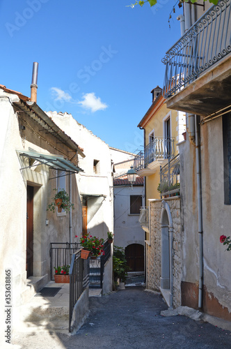 A narrow street among the old houses of an ancient Italian town © Giambattista