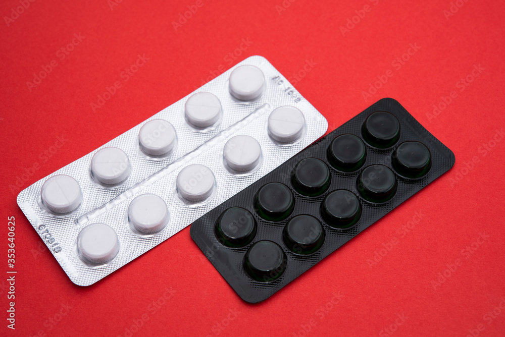 medicines in white and black packaging medicines in white and black packaging
