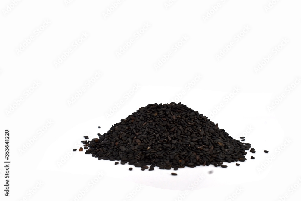 Pile of black sesame seeds isolated on white background. Clipping path Pile of black sesame seeds isolated on white background. Clipping path