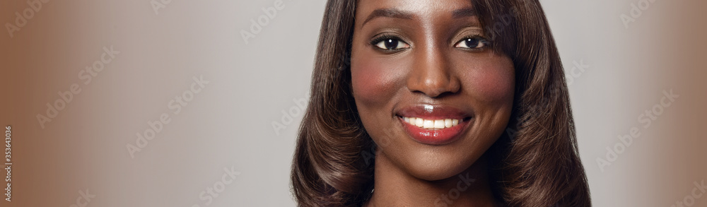 Fototapeta premium Beautiful African-American woman. Black Beauty. young adult woman with beautiful hair. Hairstyle.