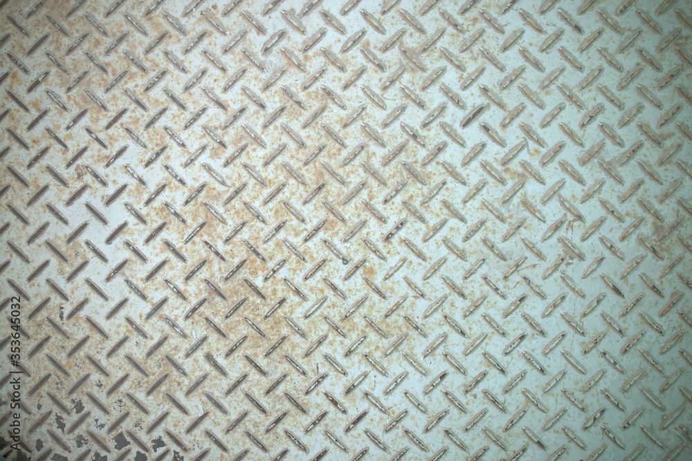 Steel floor for background or texture. Front view of a rusty panel with non-slip surface. Steel floor for background or texture. Front view of a rusty panel with non-slip surface.