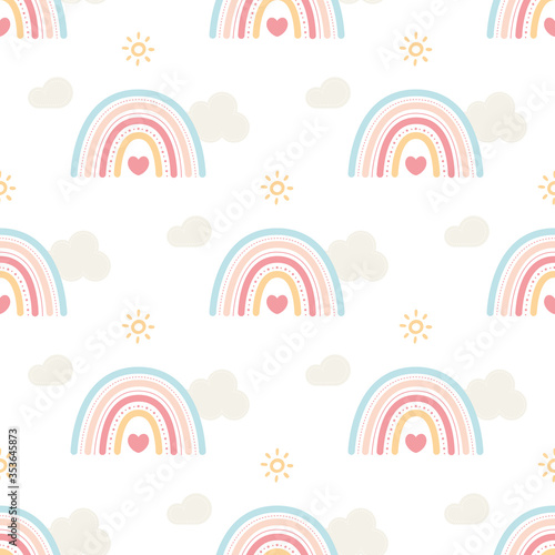 Cute pastel seamless rainbow vector pattern with hearts and clouds.