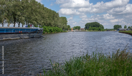Inland vessel. Barge at river. Canal. Beukers Netherlands. Hamingen. Zwartsluis. Meppeler Diep. Transport
