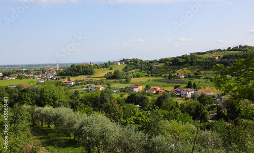panorama of the hills with few houses and cultivated fields and