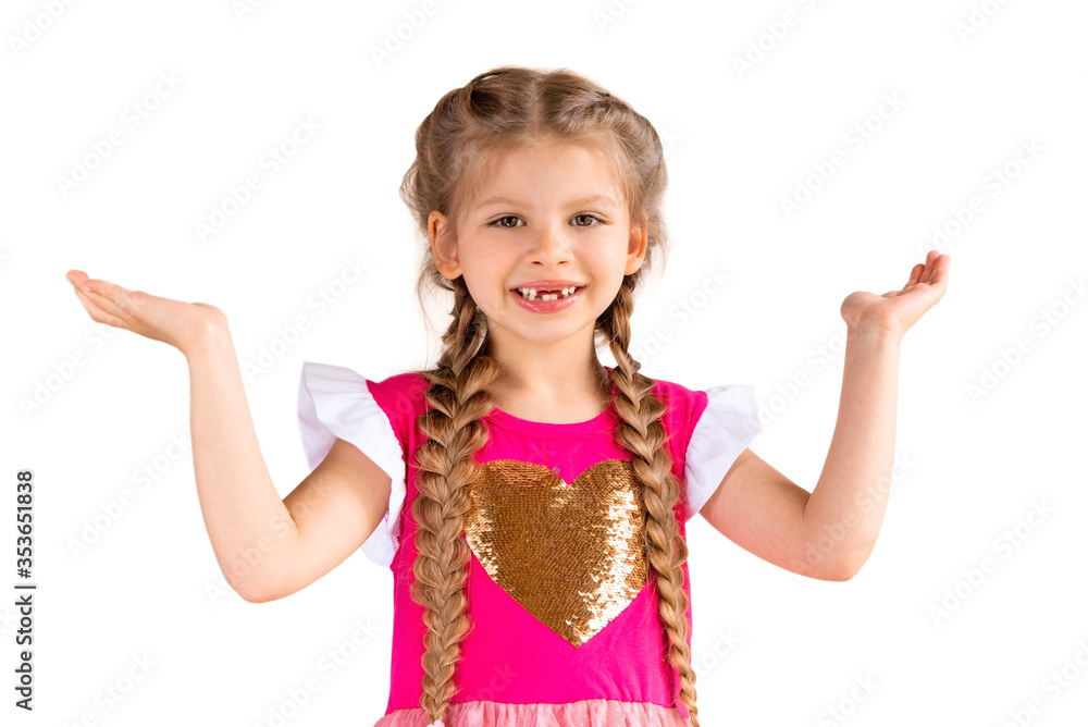 A little girl with pigtails reaches out and shows you the place for your product on an isolated white A little girl with pigtails reaches out and shows you the place for your product on an isolated white